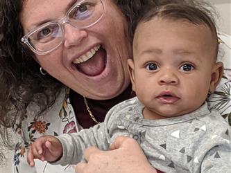a female teacher with a baby 